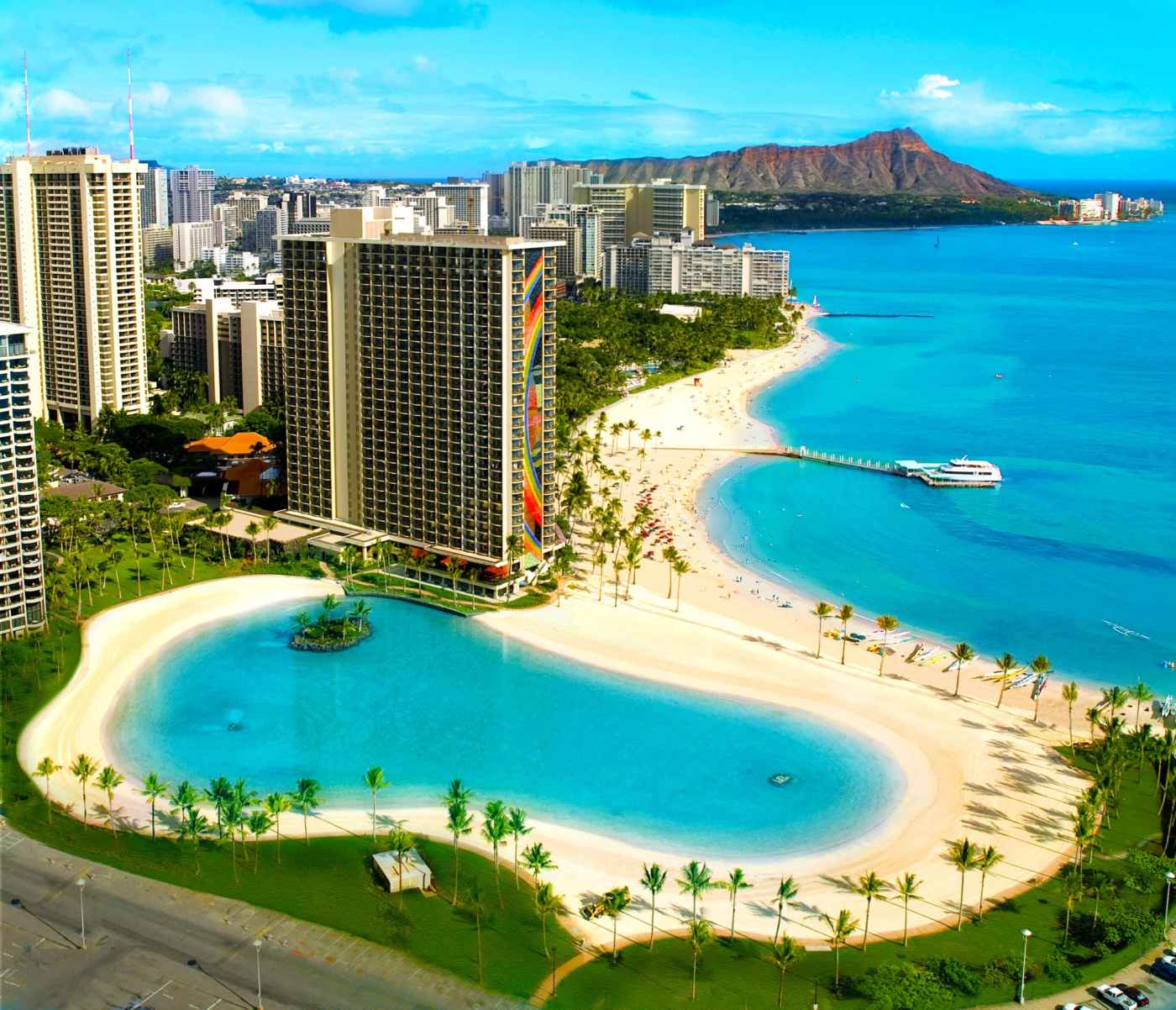 a body of water with a city in the background